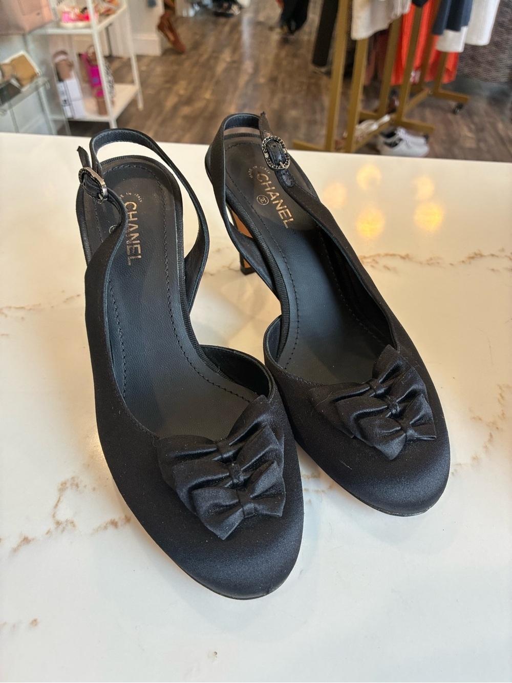 CHANEL Black Satin Slingback Pumps with Bow Accent